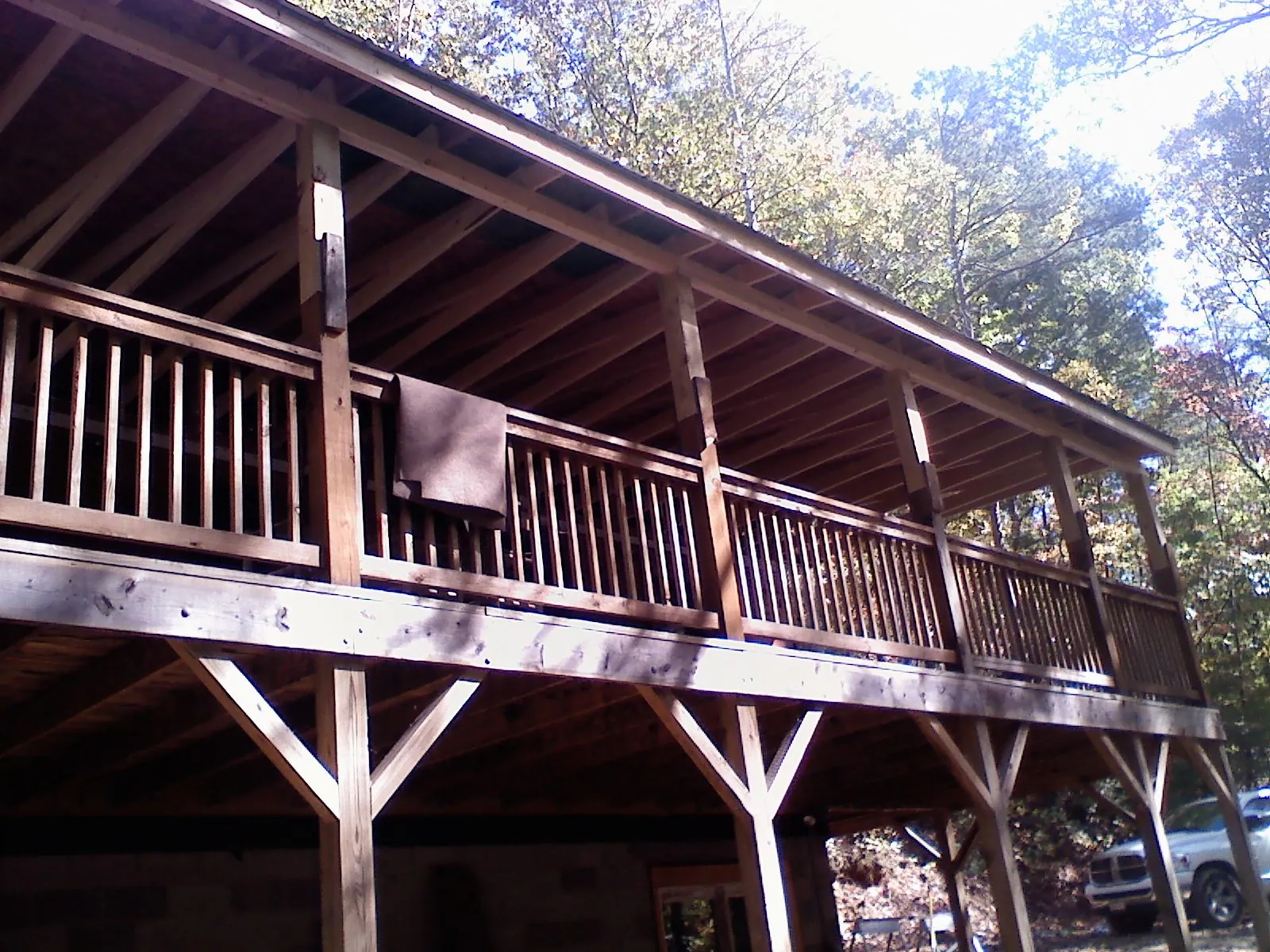 Timber framing under a new elevated porch and deck — Roof Leak Repair in Torrington by Roofing Brothers